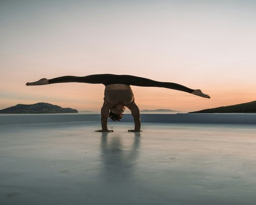 Peaceful yoga pose outdoors sunset